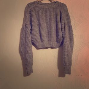 Gray sweater crop top .